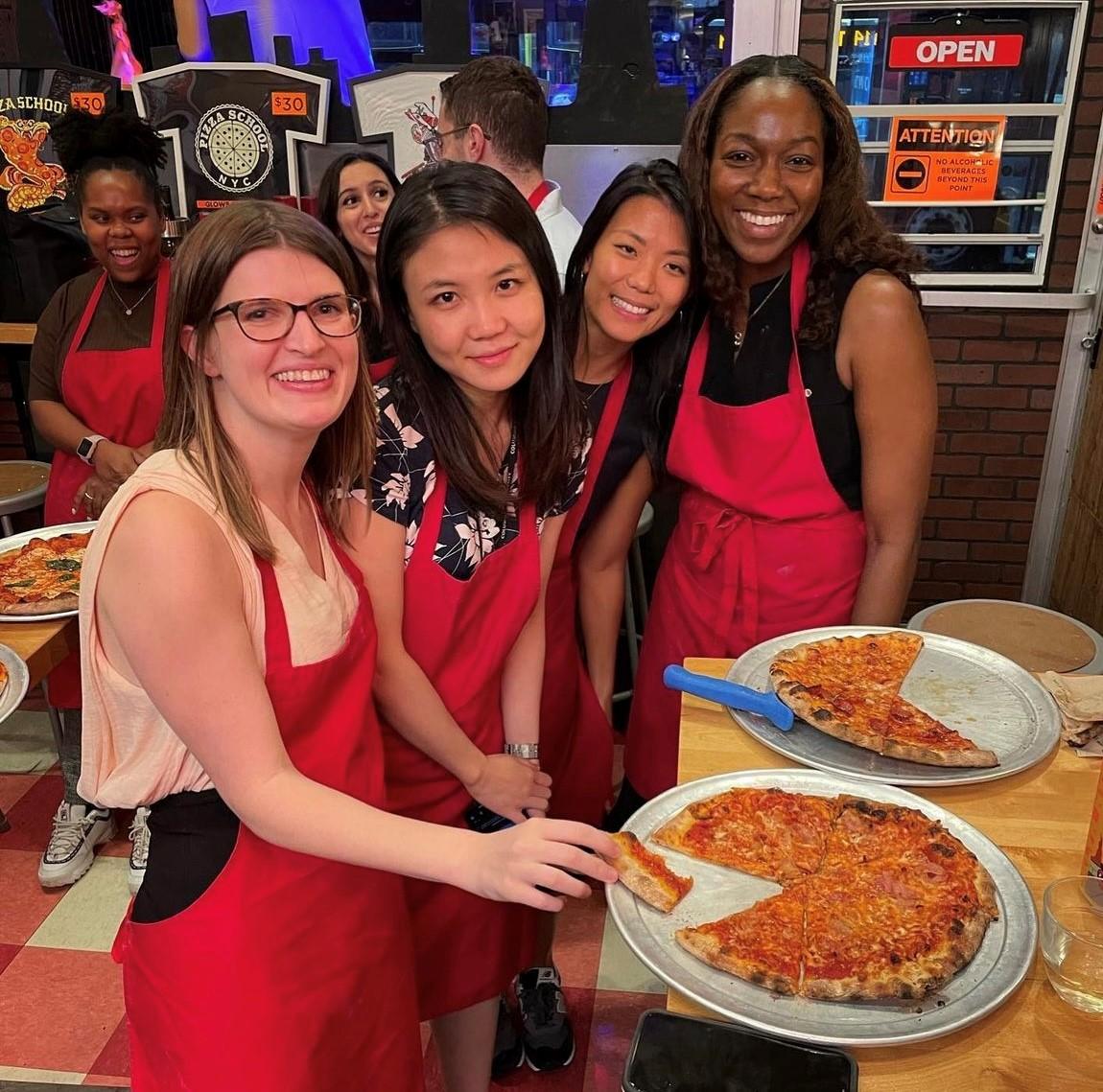 Davis Polk summer associates at a pizza making class